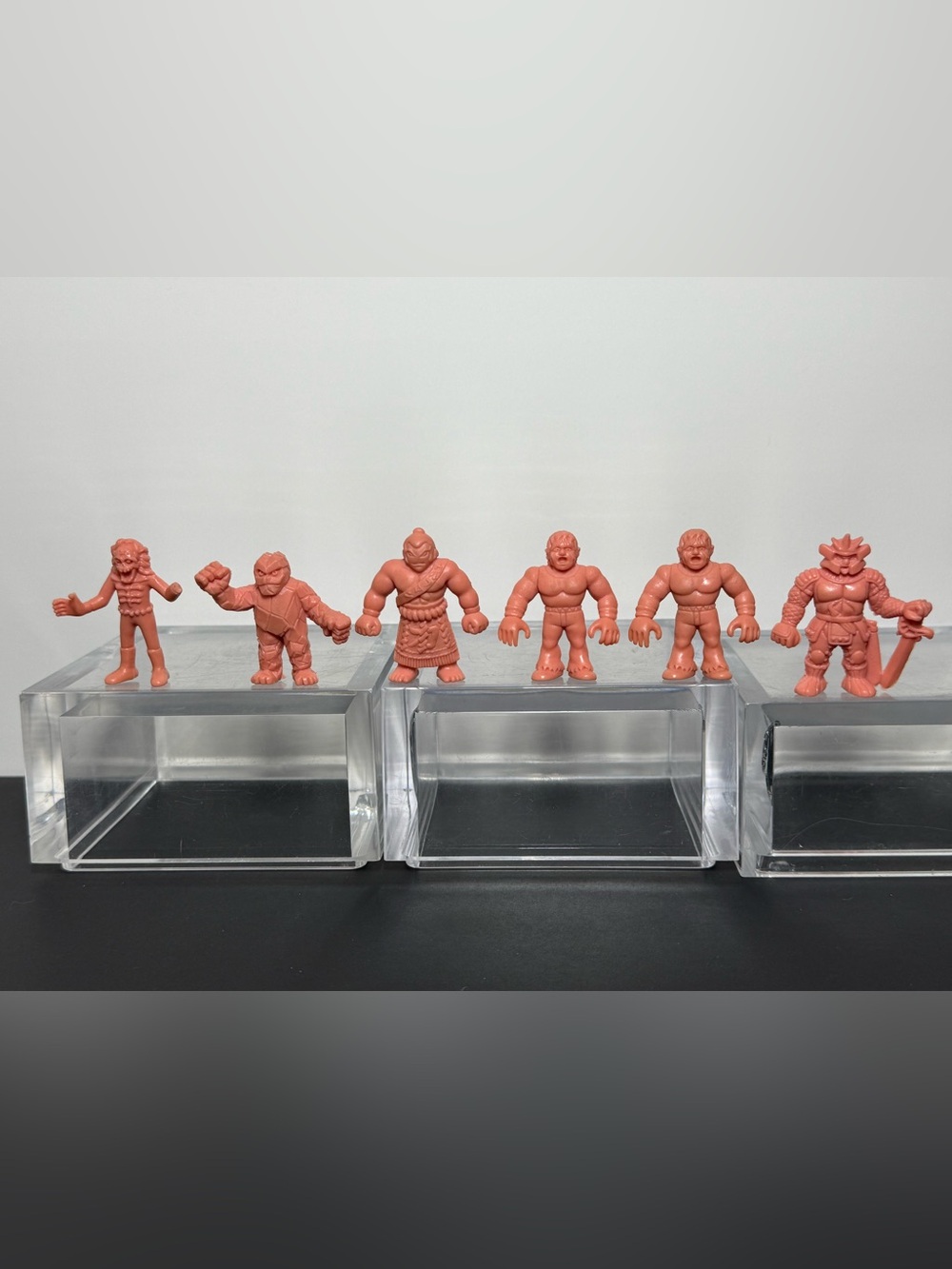 Vintage 1980s Mattel M.U.S.C.L.E. Men Figures - Orange Variant Lot of 6